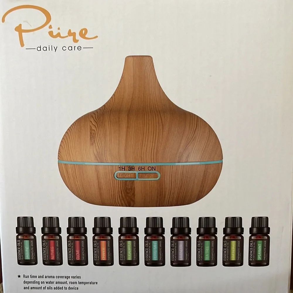 NIB Pure Daily Care Ultrasonic Aromatherapy Diffuser with 10 Pure Essential Oils
